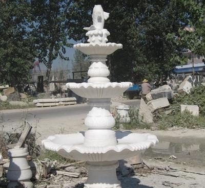 曲陽石雕風水球噴泉 晚霞紅招財擺件的藝術與風水價值